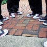 Shoes of groomsmen in circle on brick walk way at wedding ceremony in Nashville Tennessee