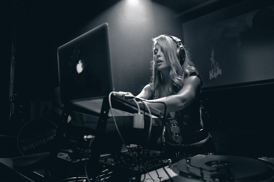 DJ Kayjay mixing music black and white beautiful blonde bombshell playmate turntables