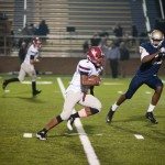 MBA football player sprints the football up the field in Tennessee