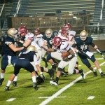 MBA football player runs the football down the field in Tennessee