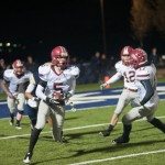 MBA football player takes the ball up the field in Tennessee
