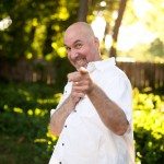 man in white sure poses outside in Tennessee