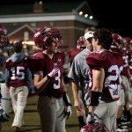 MBA football player cheers a team mate on the sidelines in Tennessee