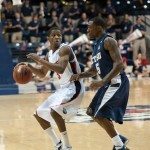 Belmont basketball player makes a move on the Defense in Tennessee