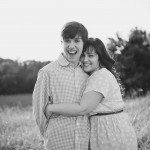 son and mother smile outside in sunny field in Tennessee