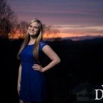 smiling blonde girl in blue dress outside at sunset in Tennessee