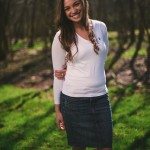 smiling girl in white sweater outside in Tennessee