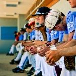 Baseball team sitting on bench intent on the game in Tennessee