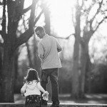 Father and daughter walk together outside in Tennessee