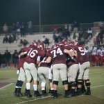 MBA football team huddle on the field in Tennessee