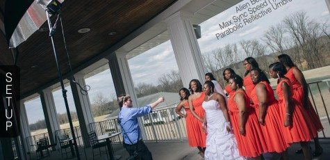 photographer has lighting setup for bridal portrait of girls