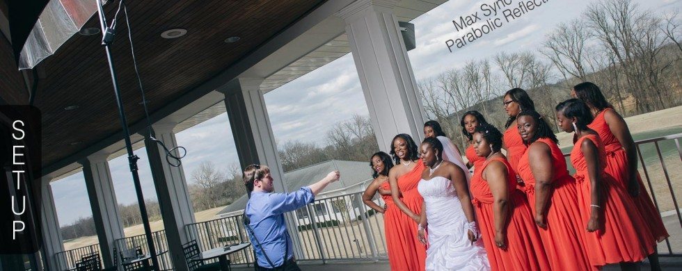 photographer has lighting setup for bridal portrait of girls