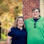 Couple next to old brick house in Murfreesboro Tennessee