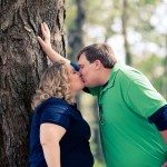 Couple kiss on tree outside in Murfreesboro Tennessee