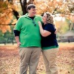 Couple look at each other outside during Fall in Murfreesboro Tennessee