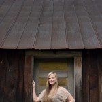 smiling blonde girl in old door way in Tennessee
